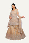Rose Gold Peplum Top and Skirt with Duppatta with Hand Work on Net Fabric
